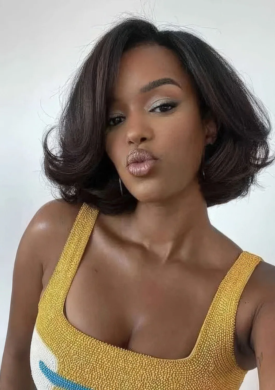 Photo showing plush bob curled ends, with the hairstyle clearly visible.