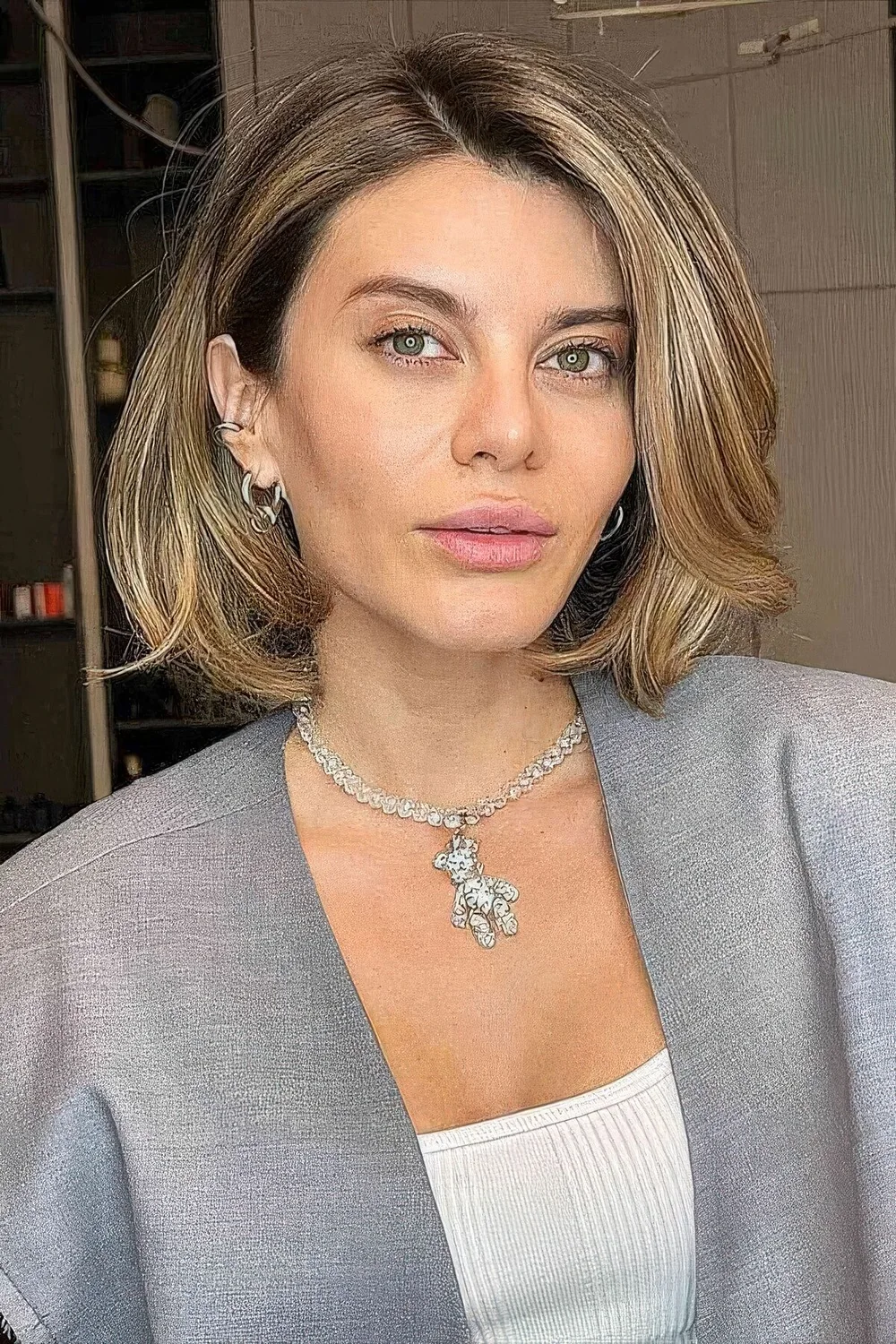 Photo showing plush bob with balayage, with the hairstyle clearly visible.