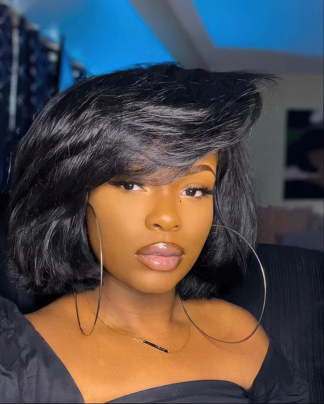 Photo showing volumetric black bob, with the hairstyle clearly visible.