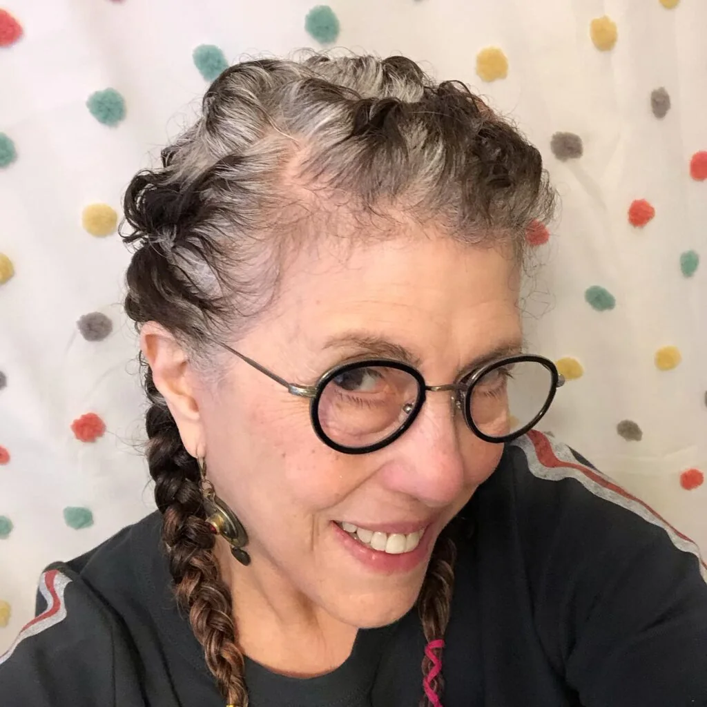 Photo showing soft Double Braids for Gray Hair, with the hairstyle clearly visible.