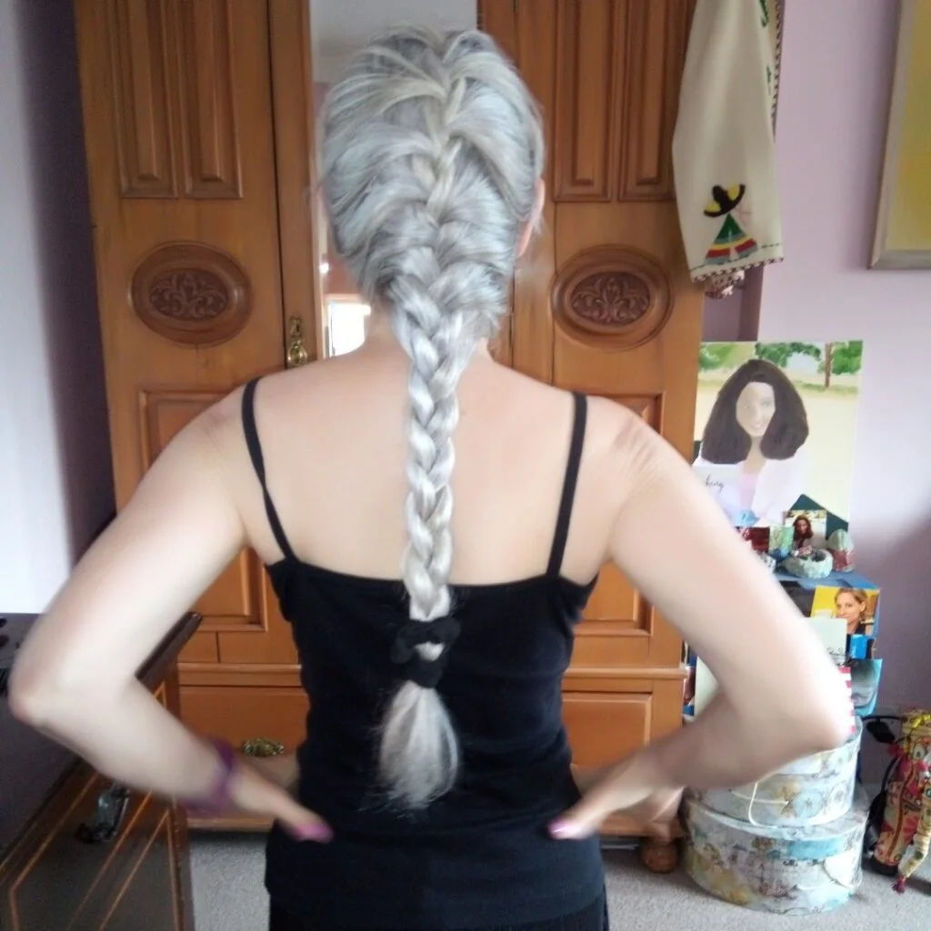 Photo showing full Silver French Braid, with the hairstyle clearly visible.
