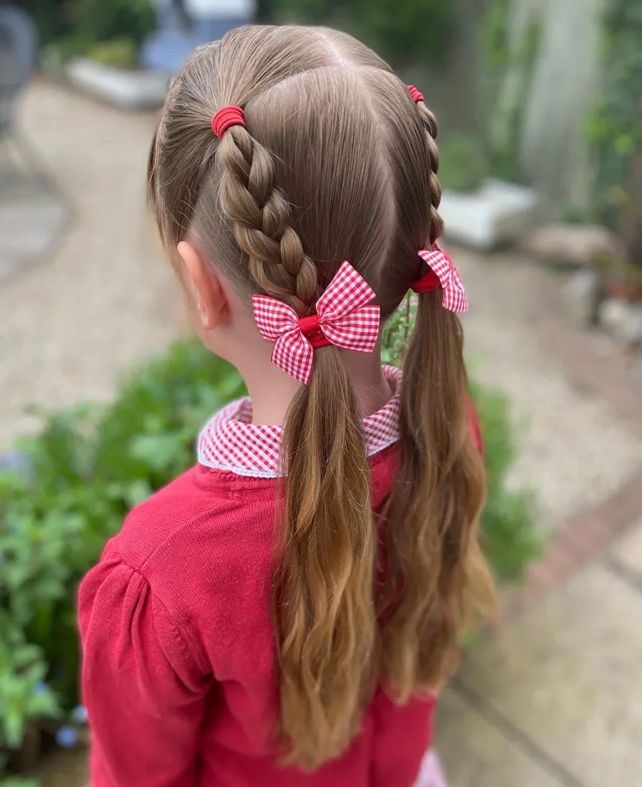 Back view of bubble pigtails with bright elastics for school