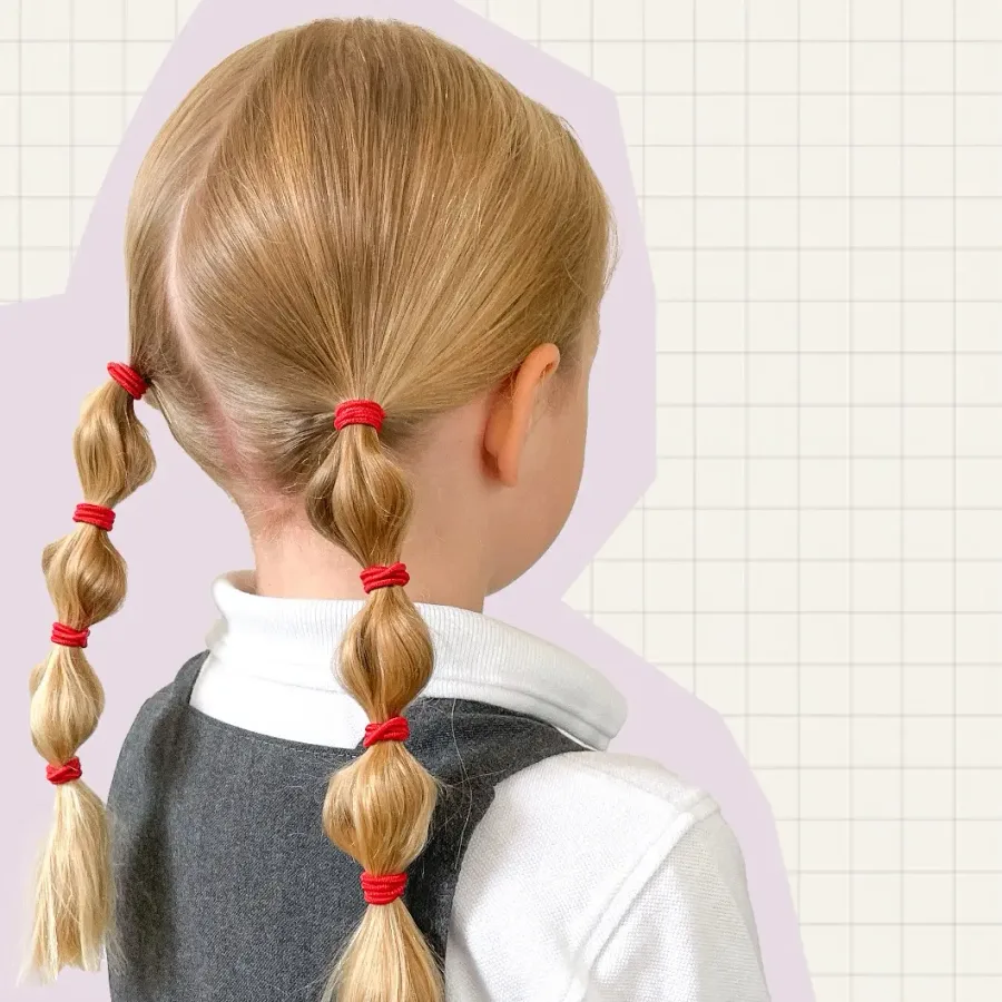 Back view of low bubble pigtails tied near the nape for school