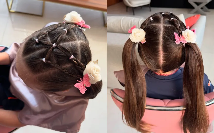 Braided school updo decorated with small flower clips