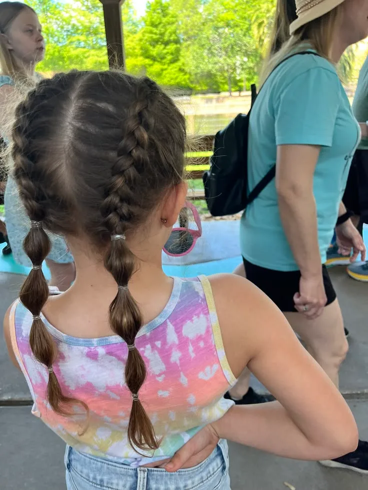 Back view of double braids made for active school days