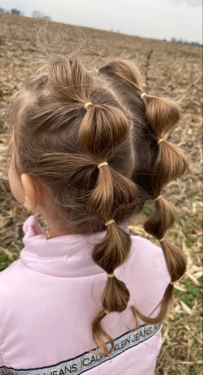 Stacked bubble pigtails with several elastics for school
