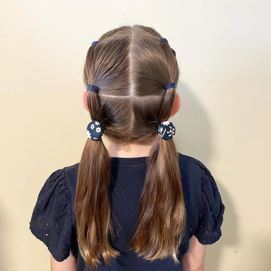 Low pull-through pigtails with elastic sections for school