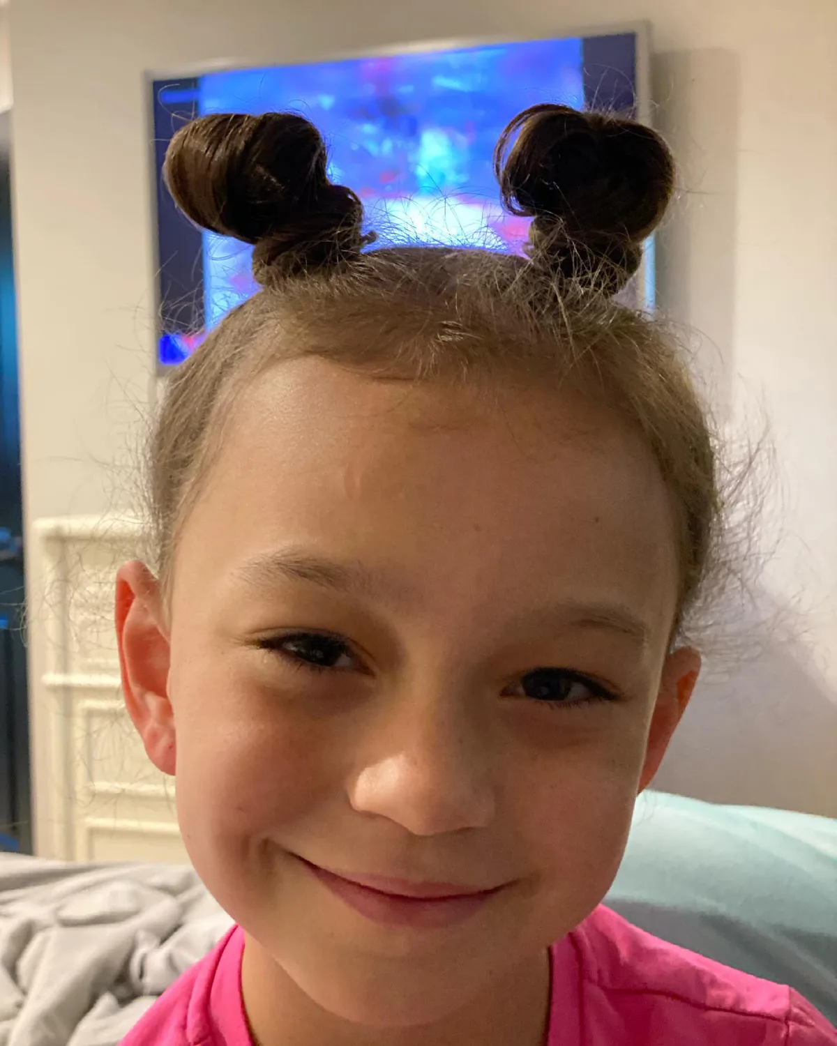 shoulder straight brunette bun shown as a school hairstyles idea, featuring brunette color