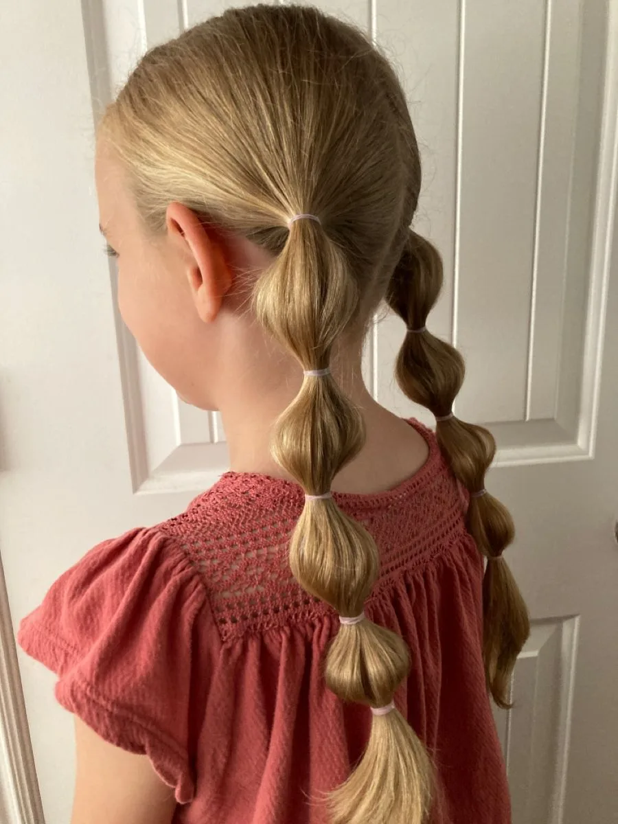 Everyday side braid on long hair for a quick school hairstyle