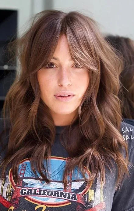 Photo showing wavy shag haircut, with the hairstyle clearly visible.