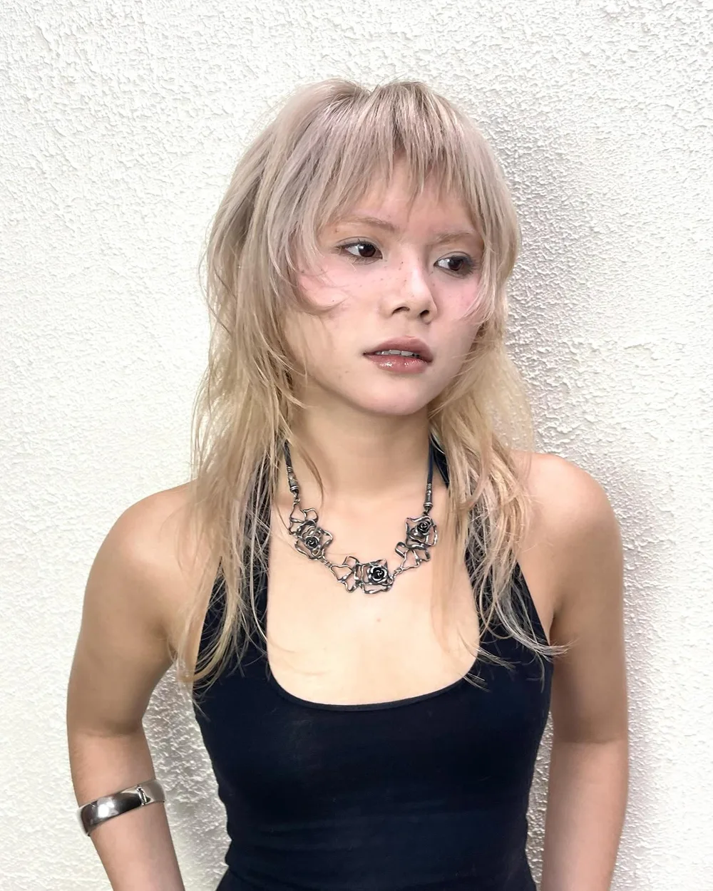 chest straight ash shag with wispy fringe shown as a shag hairstyles for medium length thin fine hair idea
