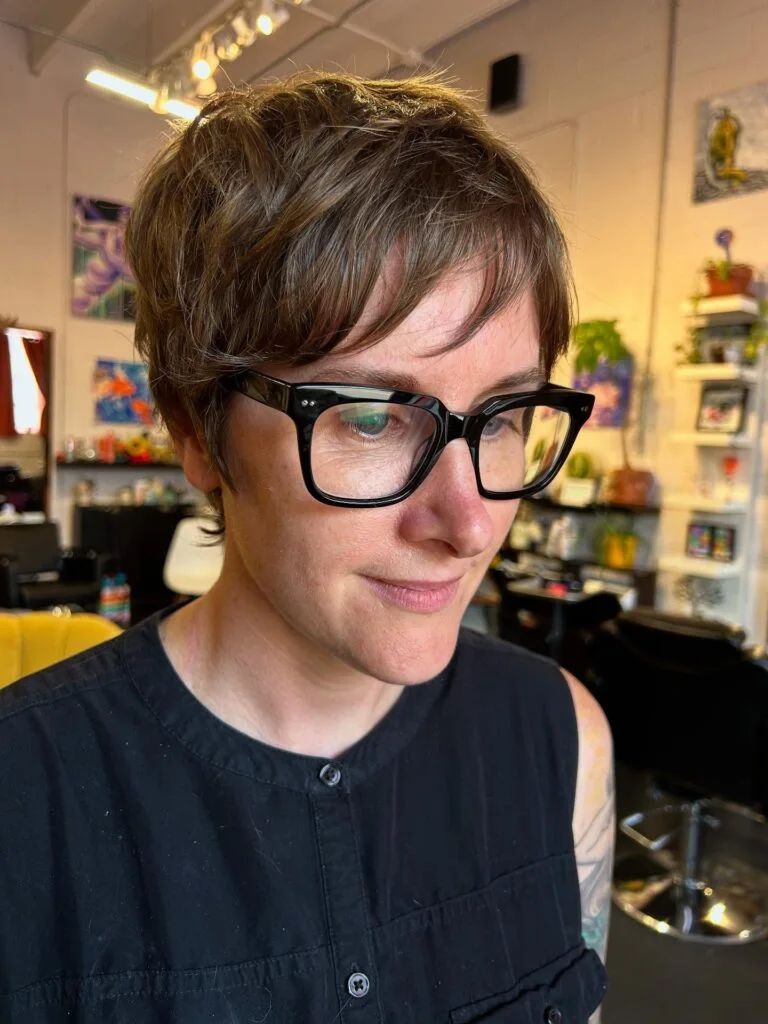 ear straight brunette pixie shown as a shag pixie hairstyles thin fine hair idea, featuring brunette color