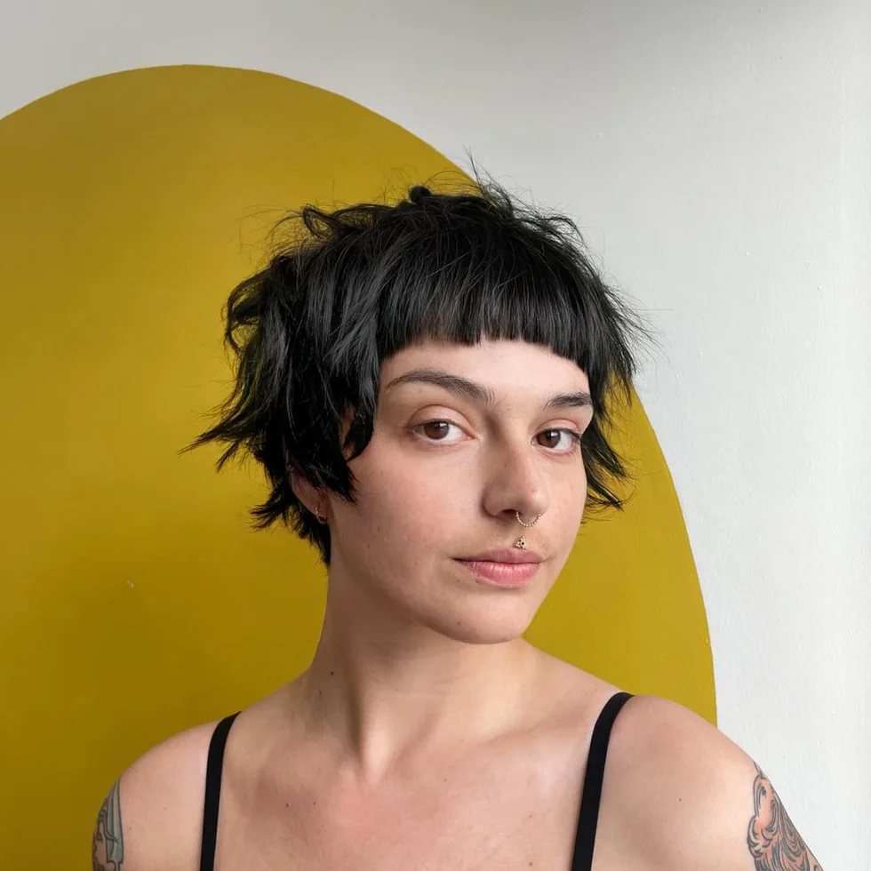 ear straight chestnut pixie with micro fringe shown as a shag pixie hairstyles thin fine hair idea