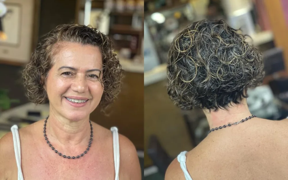 neck curly silver curly style shown as a shaggy bob for older women idea
