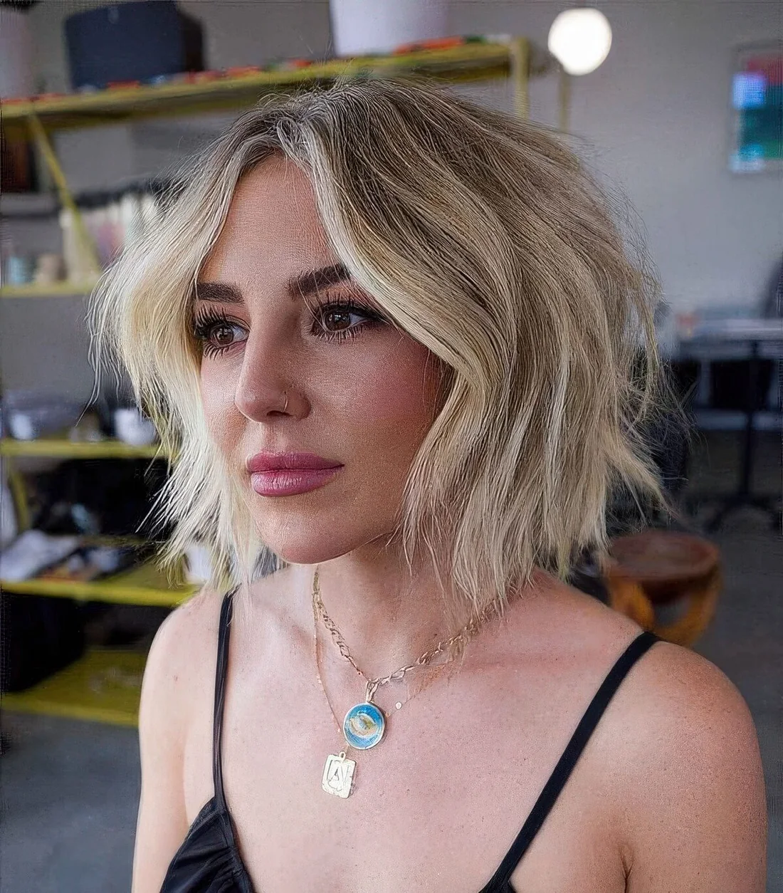 Blonde shaggy bob hairstyle with layers.