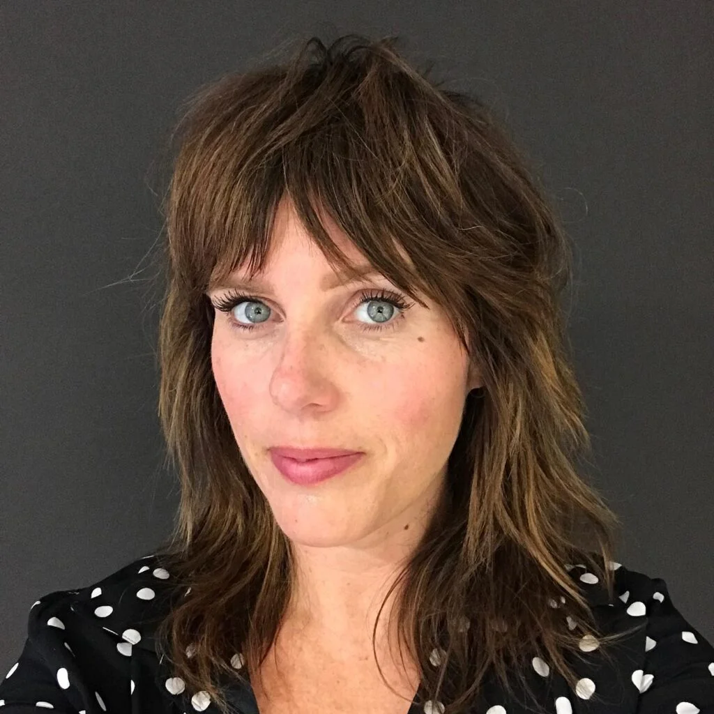 shoulder wavy silver shag with curtain fringe shown as a shaggy lob idea, featuring wavy texture