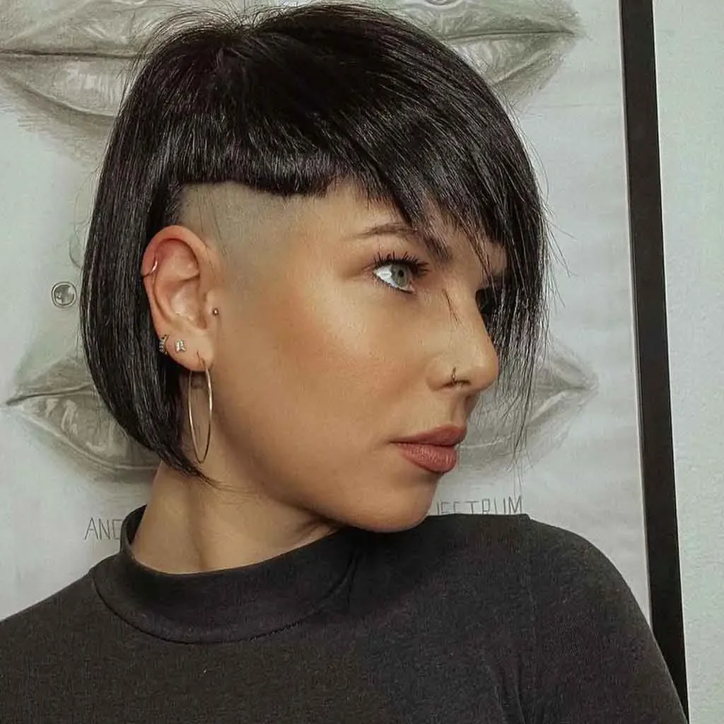 ear straight golden mullet with micro fringe shown as a shaggy pix mullet idea
