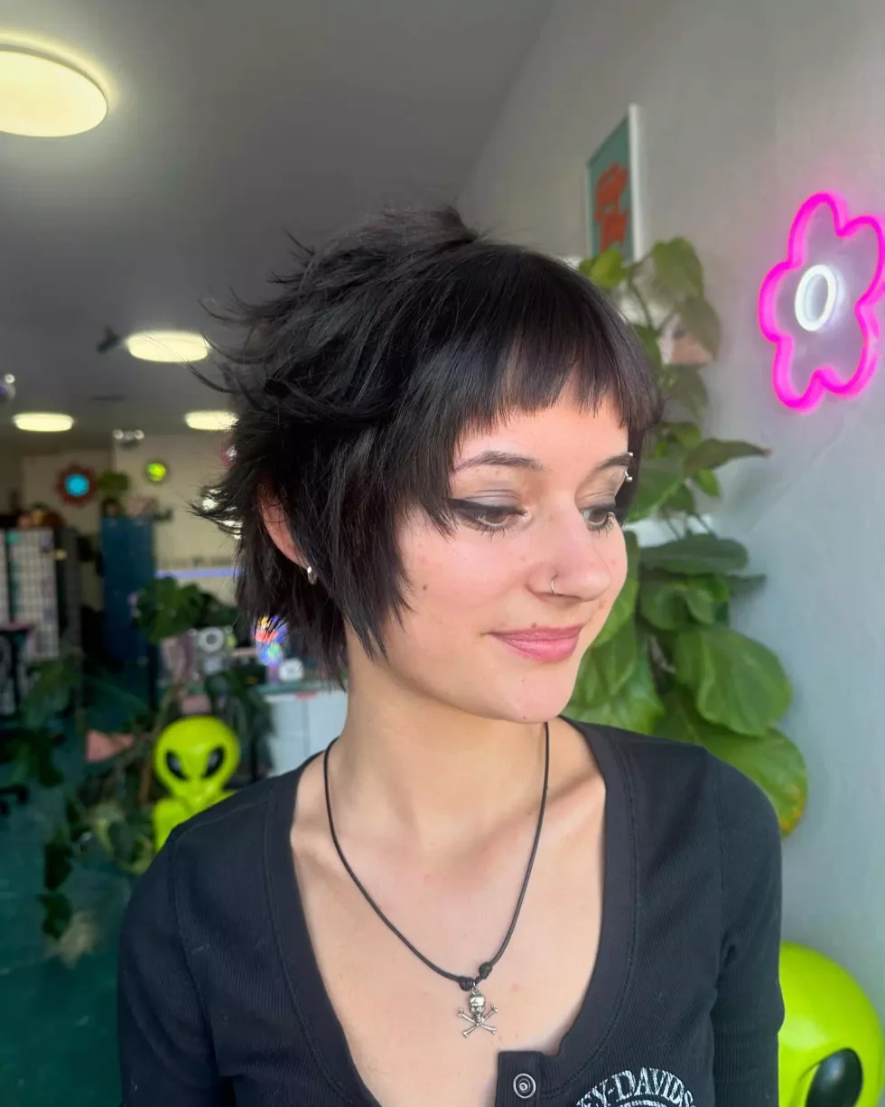 jaw wavy blue color with blunt fringe shown as a shaggy pix mullet idea