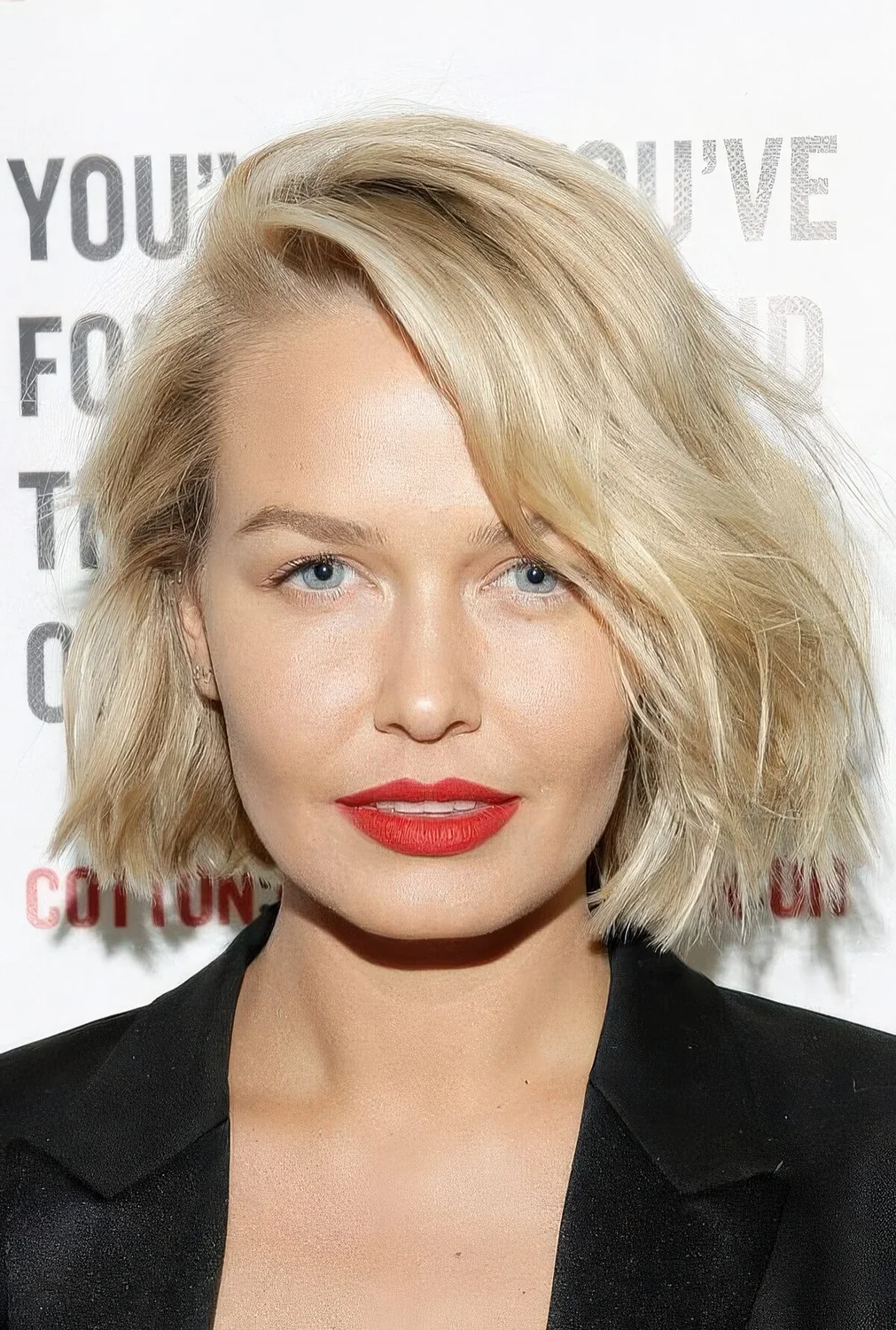 Messy textural short bob in creamy blonde.