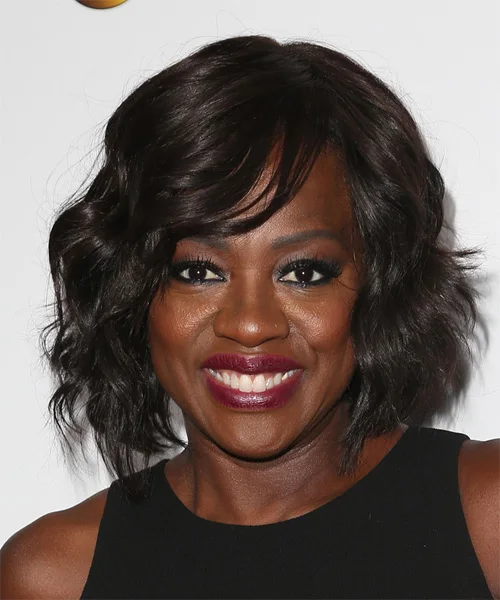 shoulder wavy black bob with side swept fringe shown as a short bob hairstyles for thin fine hair with a round face idea