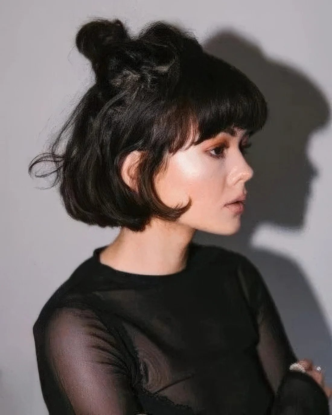 Photo showing half-up knot, with the hairstyle clearly visible.