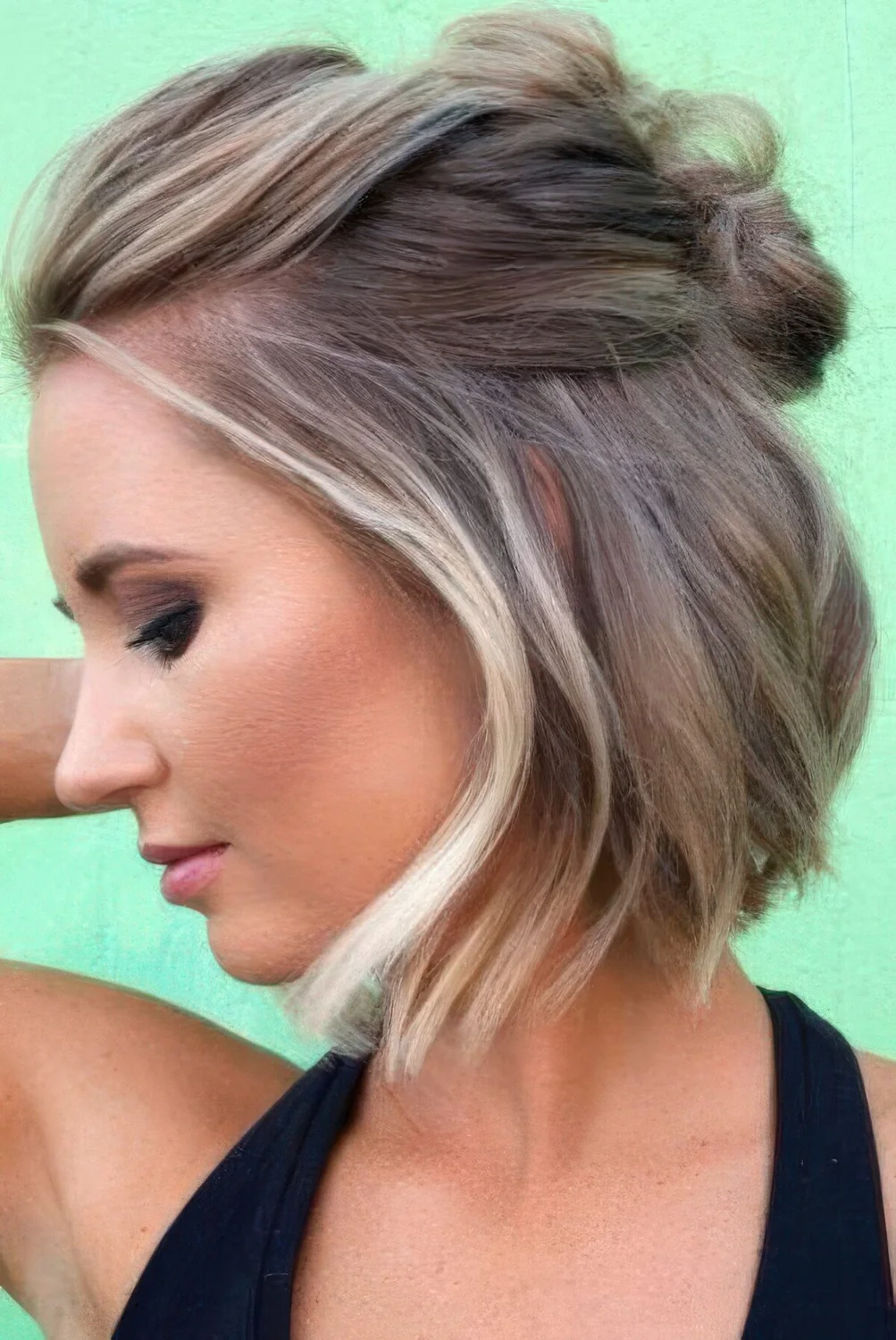 Photo showing half-up double knot, with the hairstyle clearly visible.