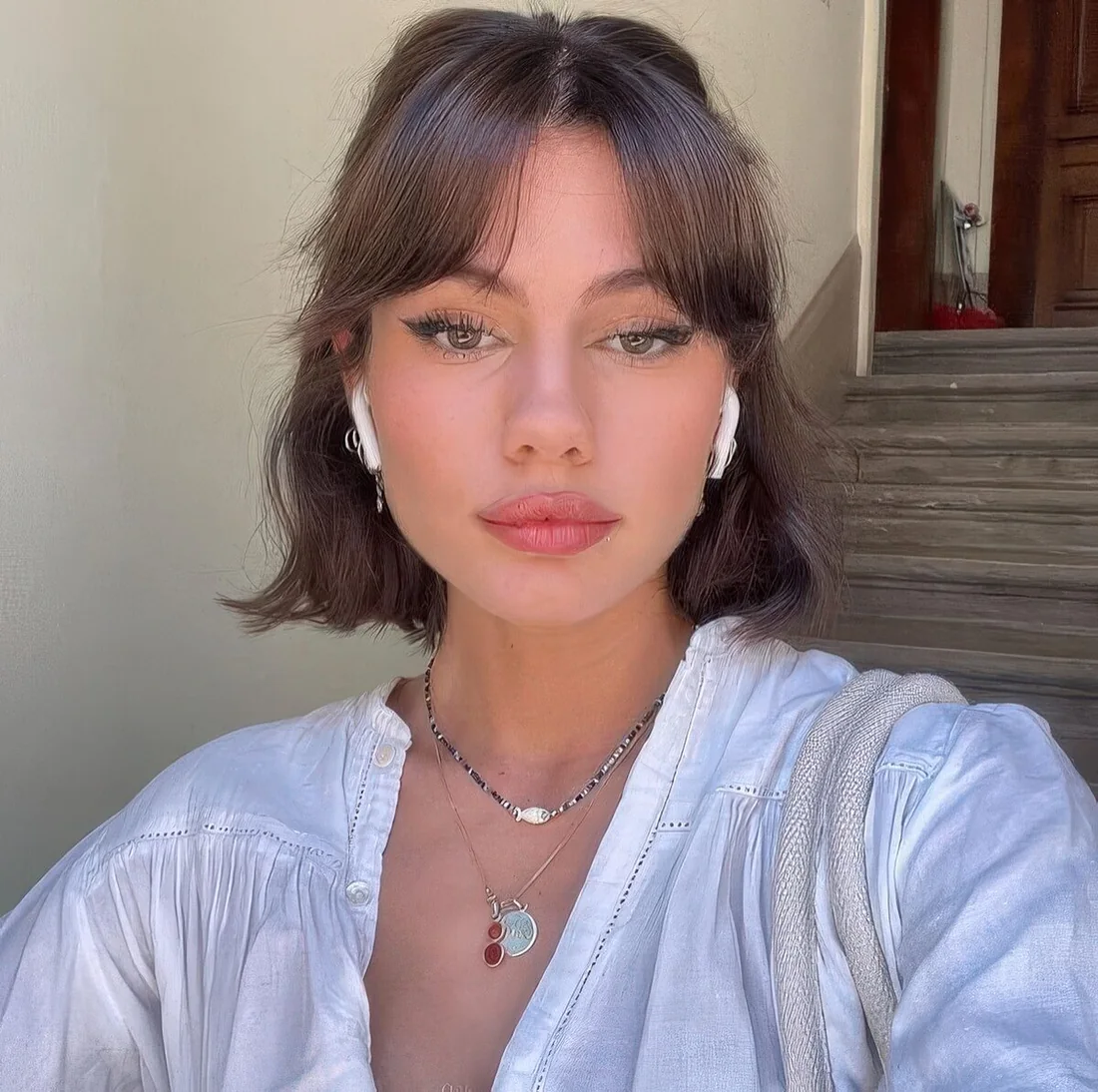 Photo showing half-up bangs, with the hairstyle clearly visible.