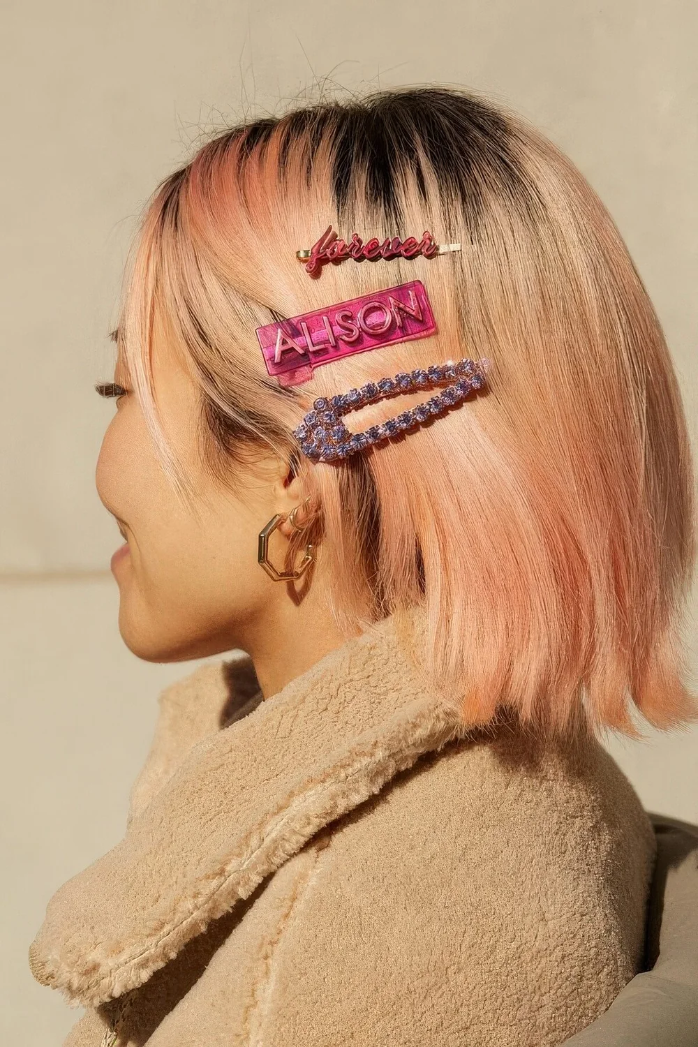 Photo showing glam pink clips, with the hairstyle clearly visible.
