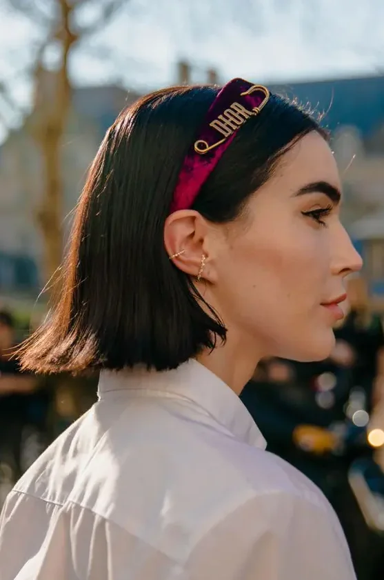 Photo showing padded headband, with the hairstyle clearly visible.