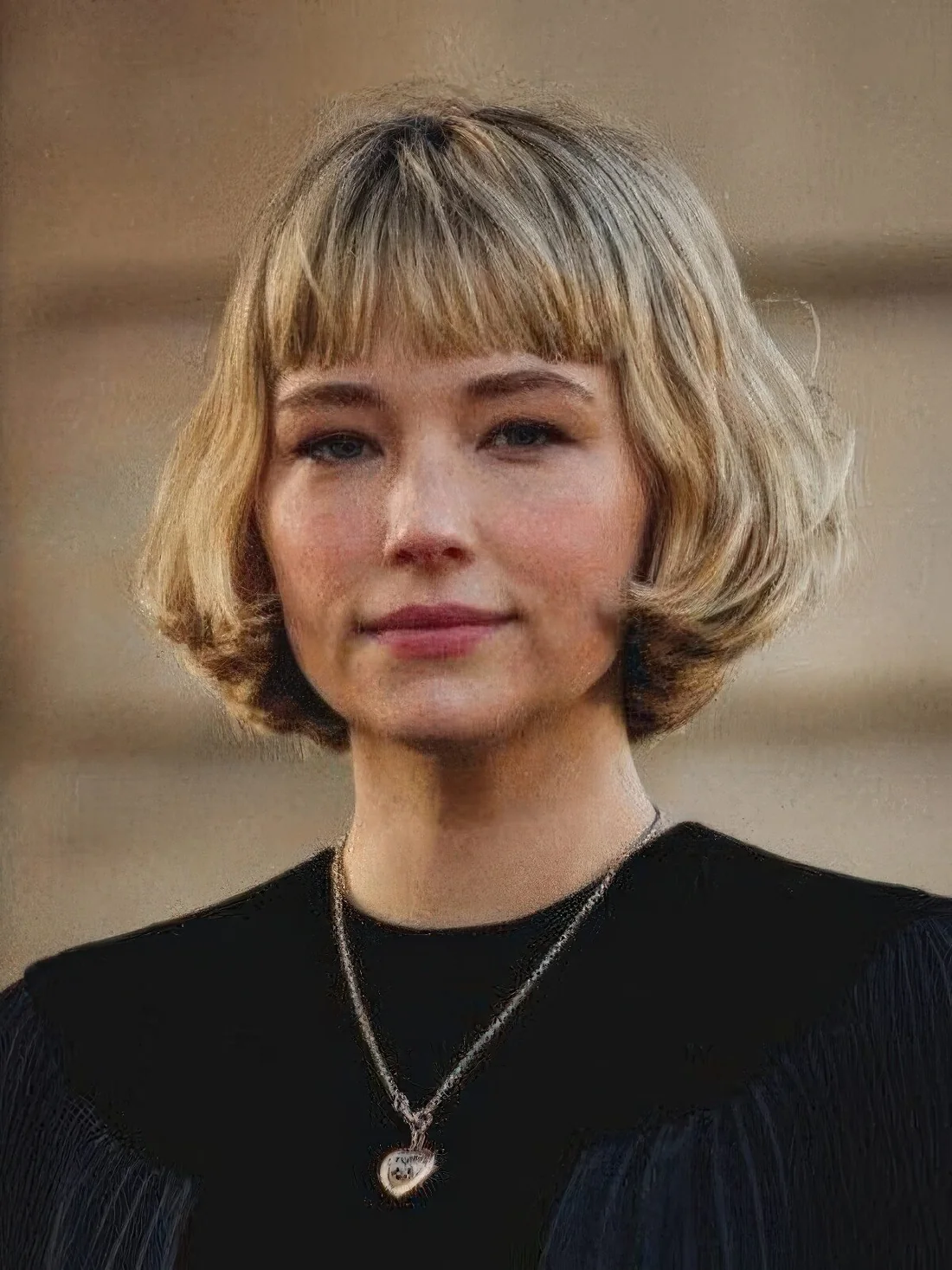 Photo showing blonde bob curled ends, with the hairstyle clearly visible.