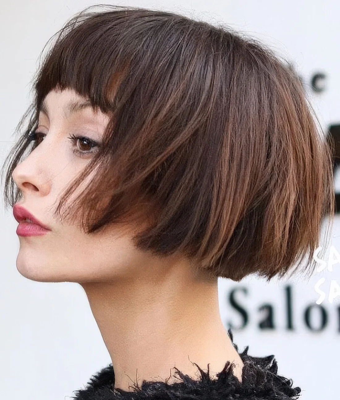 Photo showing breezy brown bob, with the hairstyle clearly visible.