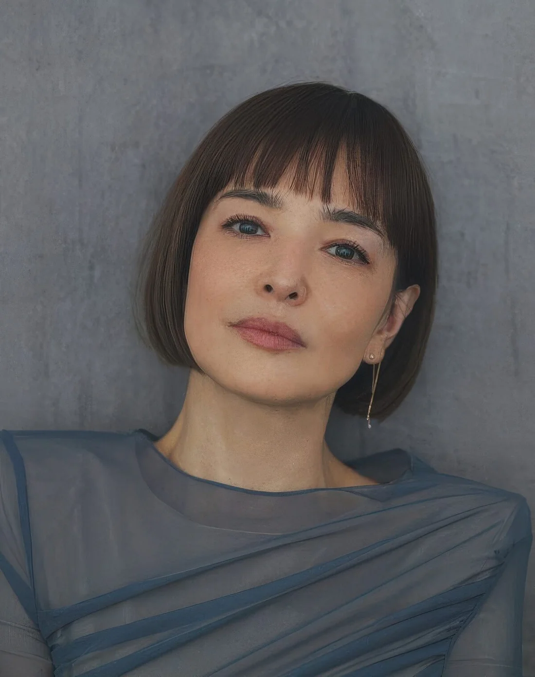 Photo showing chin brown bob, with the hairstyle clearly visible.