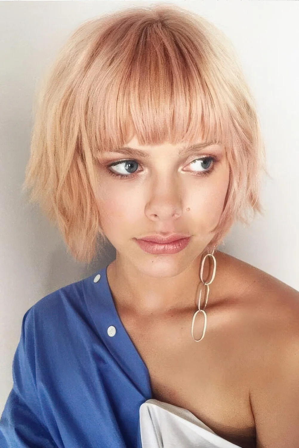 Photo showing peachy bob, with the hairstyle clearly visible.