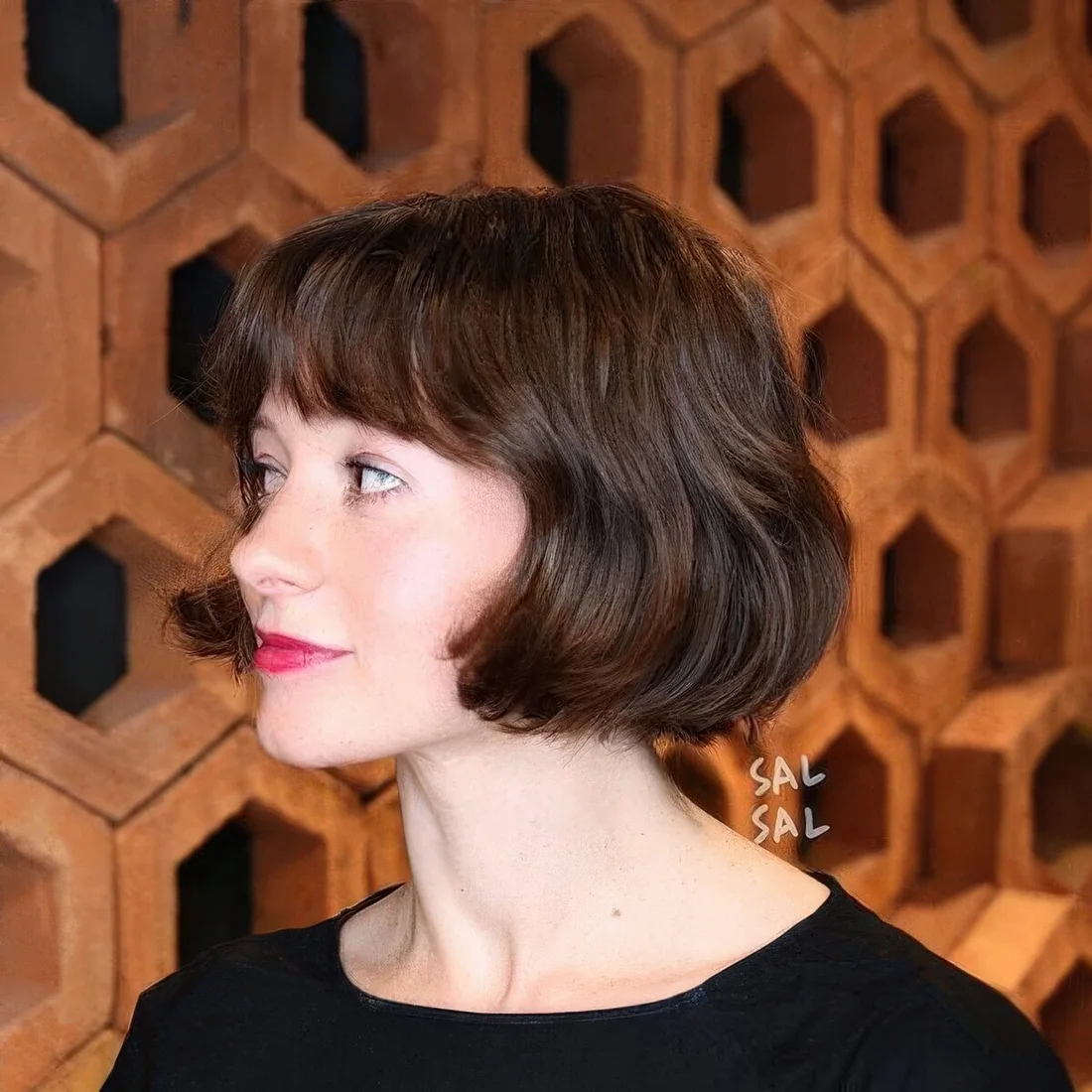 Photo showing wavy French bob, with the hairstyle clearly visible.