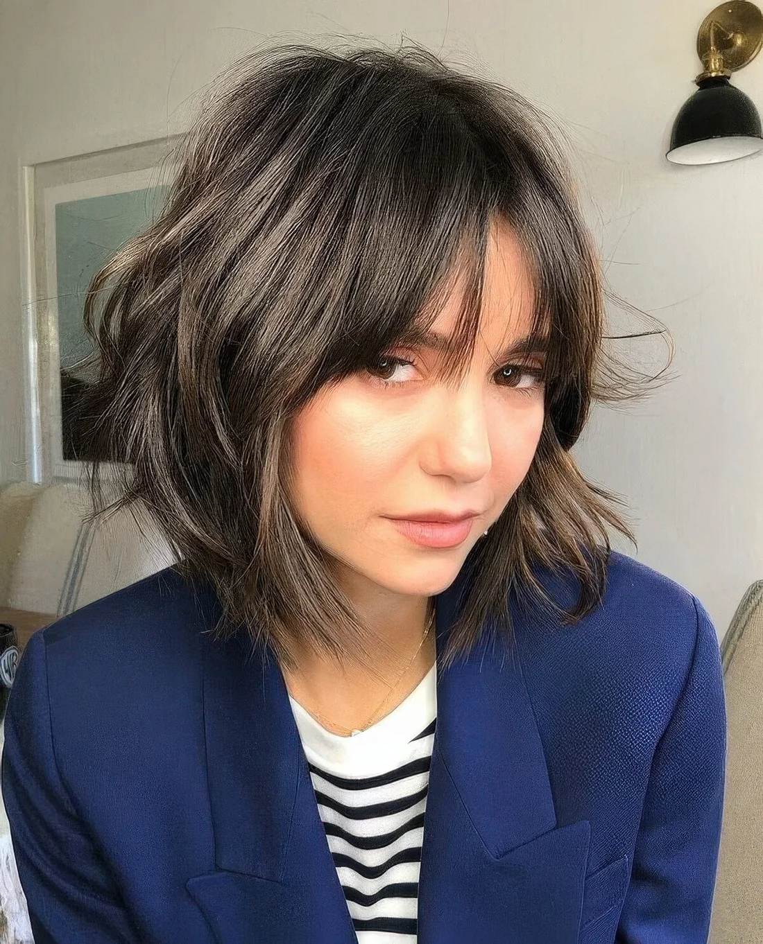 Photo showing shaggy bob hairstyle, with the hairstyle clearly visible.