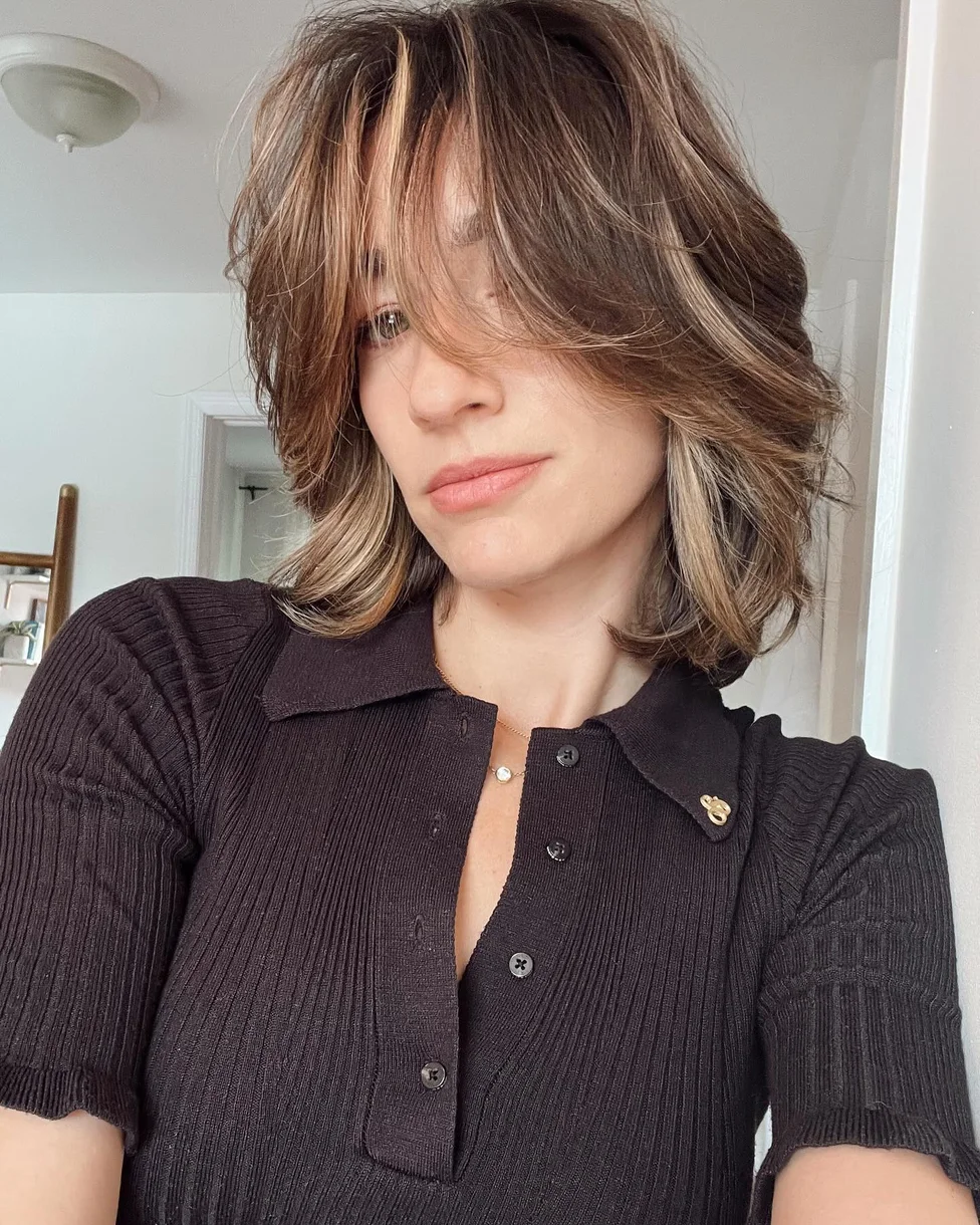 shoulder curly chestnut curly style with curly fringe fringe shown as a short butterfly haircuts idea
