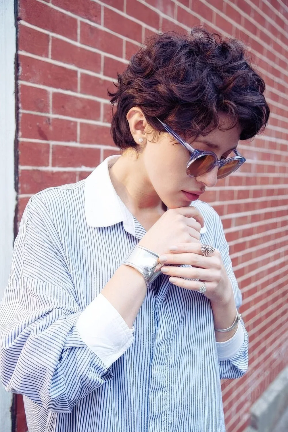 Chocolate brown wavy bixie and a lot of volume.