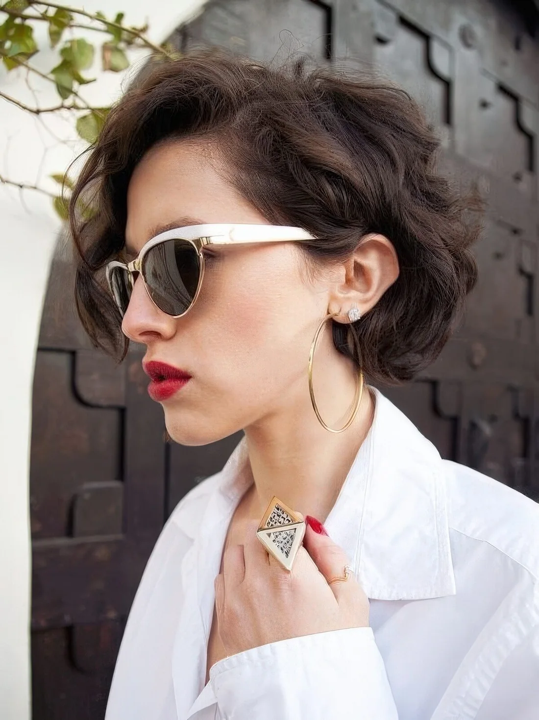 Very short fresh stacked curly bob to highlight the texture of your hair.