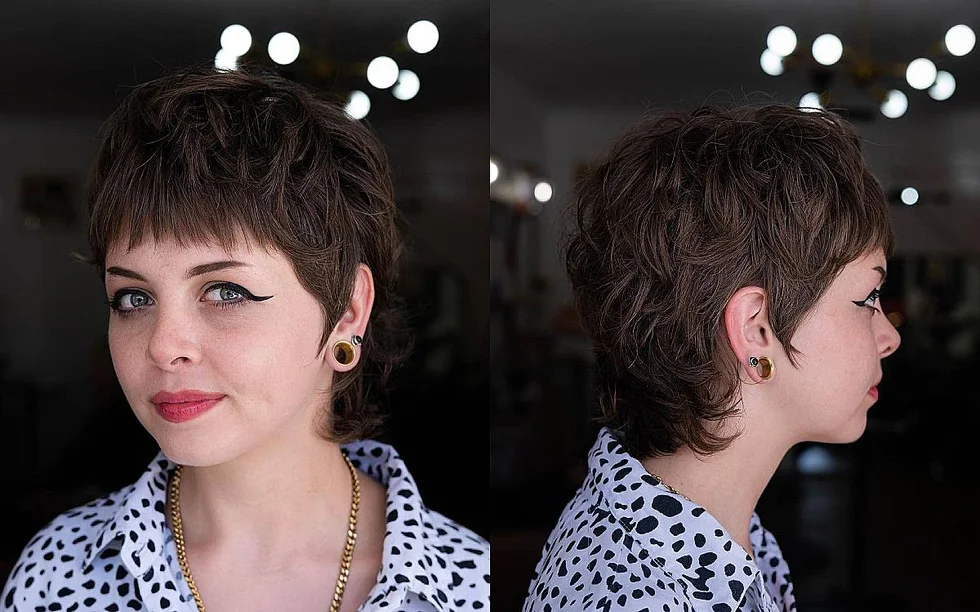 ear straight chestnut pixie with micro fringe shown as a short fine hairstyles for women in their 40s idea