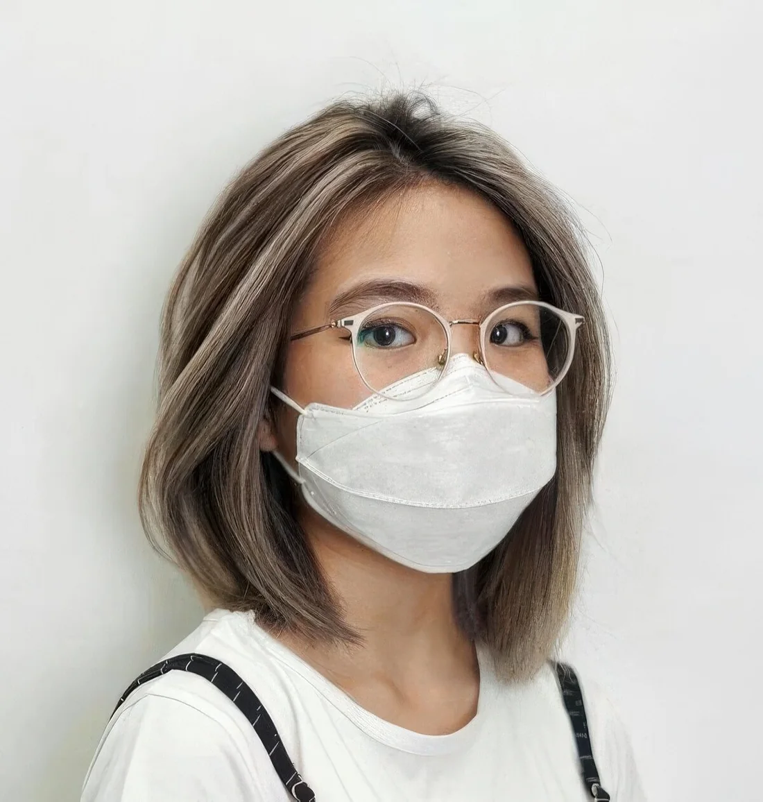 Photo showing long bob hairstyle, with the hairstyle clearly visible.