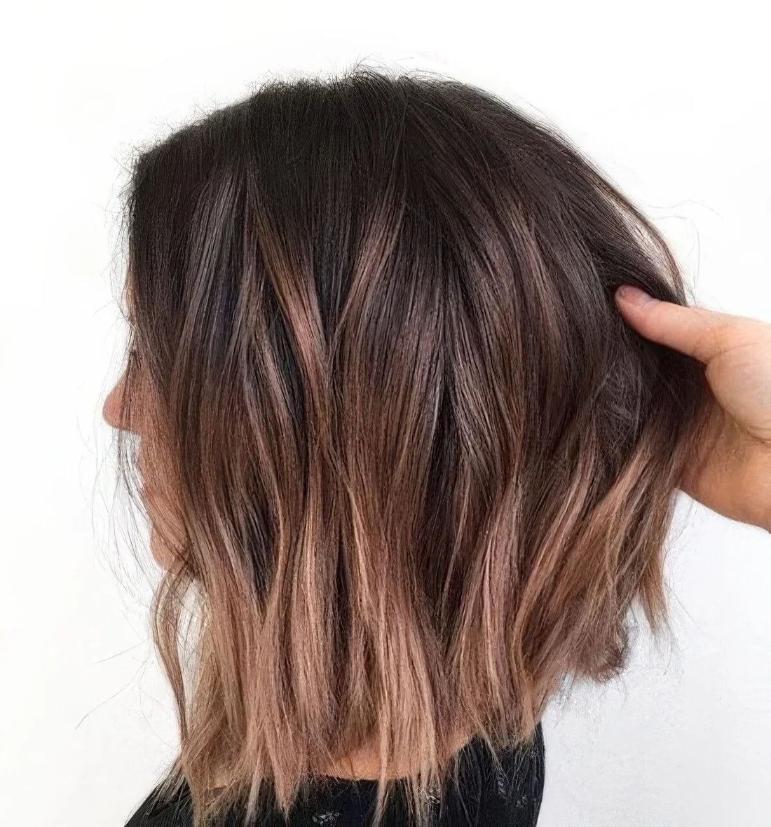 Dark brown, almost black bob with copper balayage.