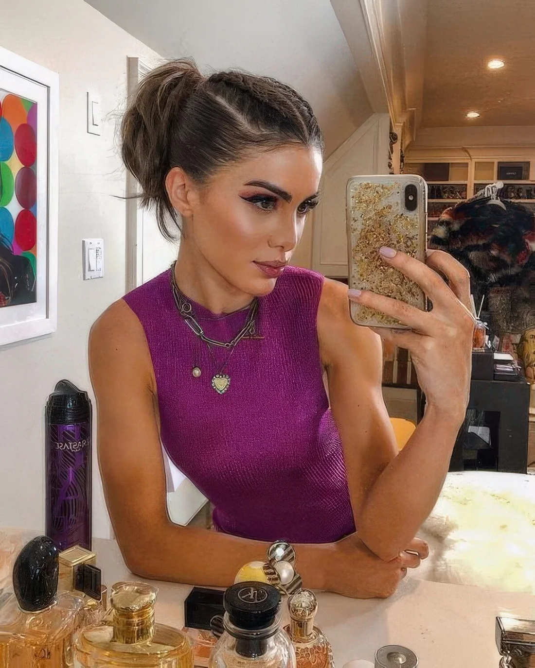 High ponytail with two braids on top.