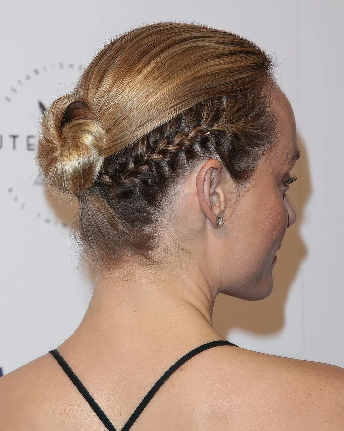 Photo showing ballerina bun hairstyle, with the hairstyle clearly visible.
