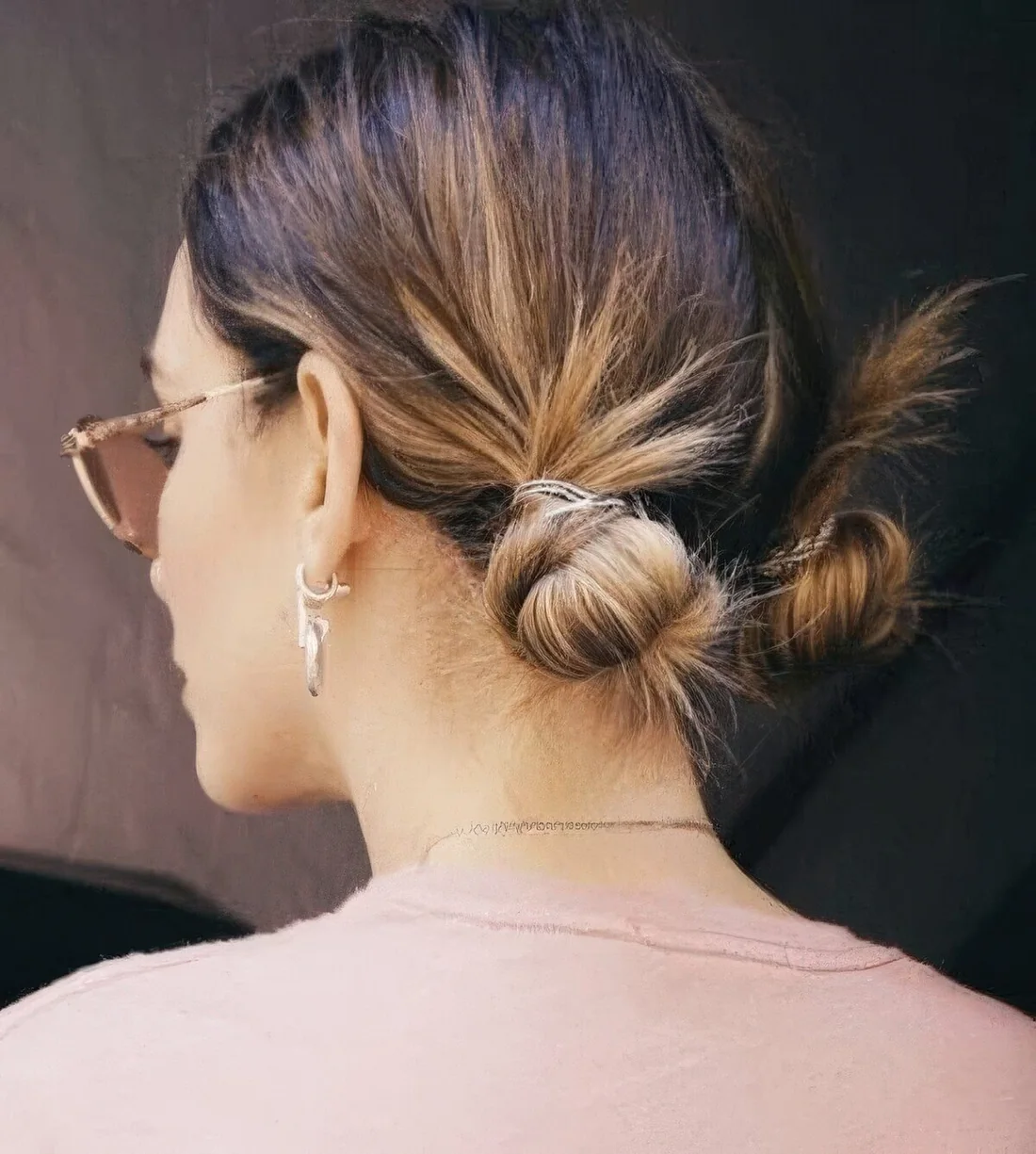 Two low buns are a great way to style short hair and look super cute and girlish at the same time.