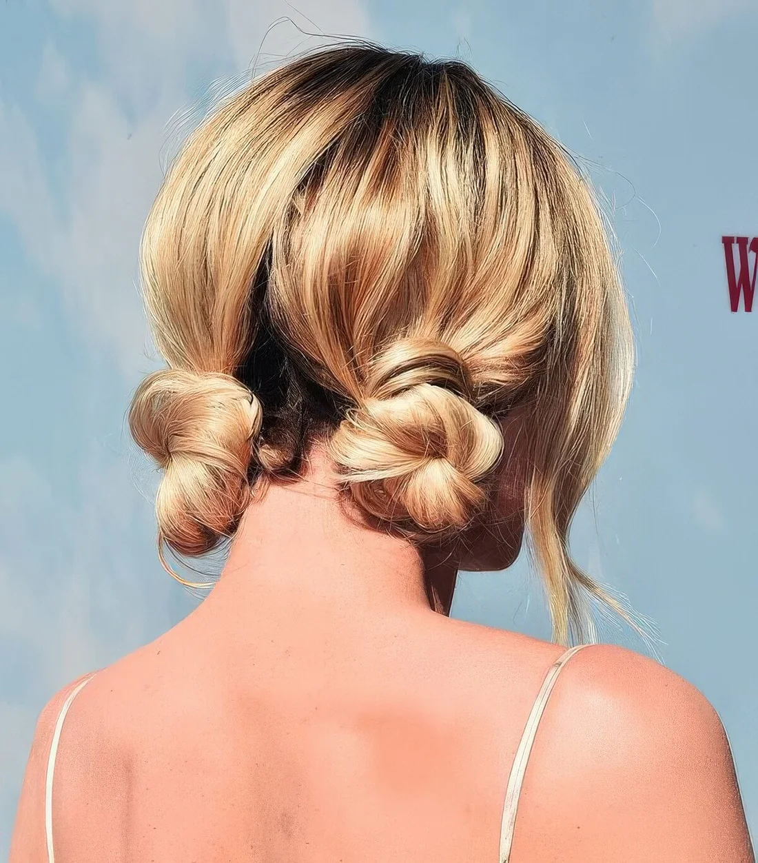 Low wrapped space buns plus face-framing hair are great for a cute look.