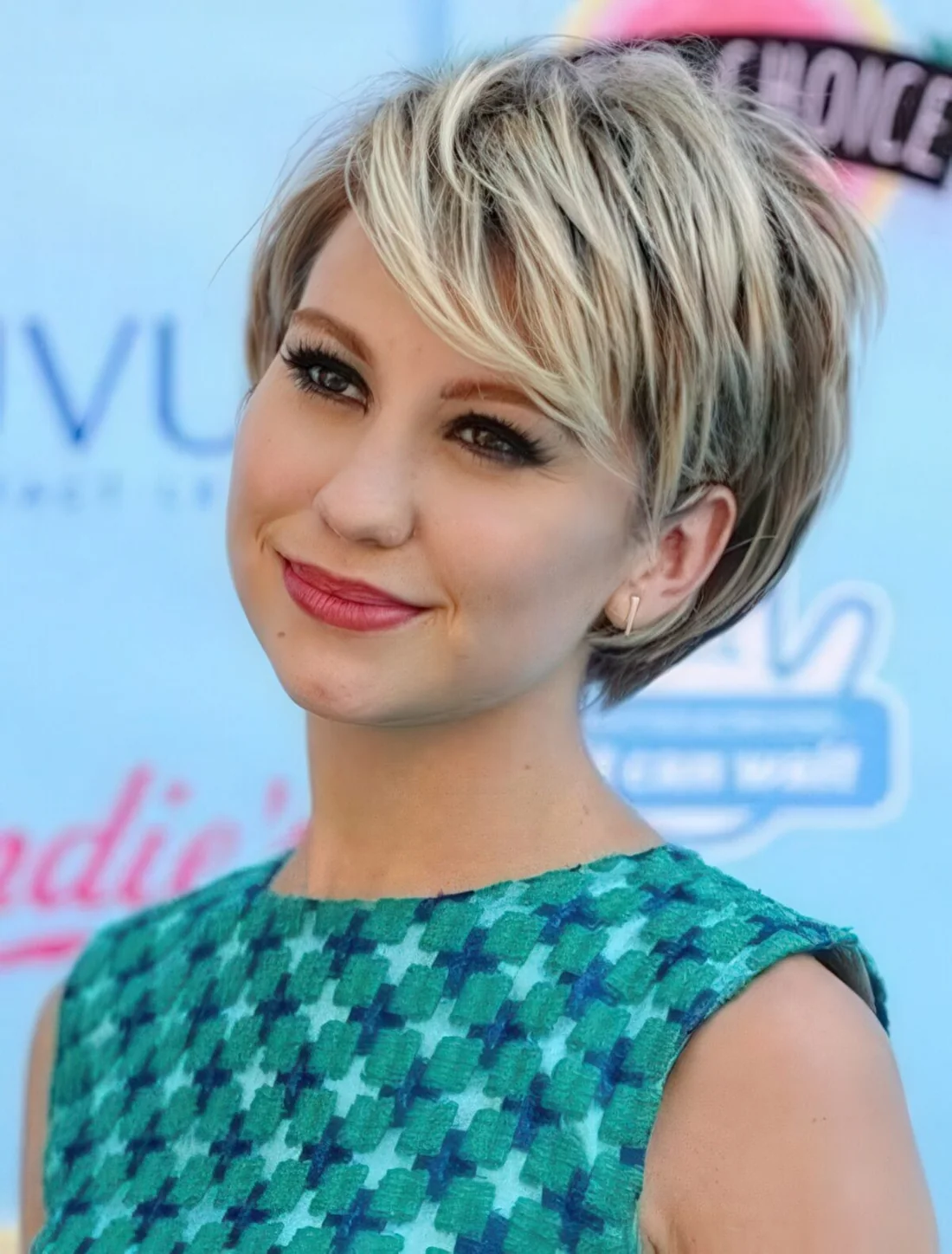 Short bob haircut with layers and side bangs.