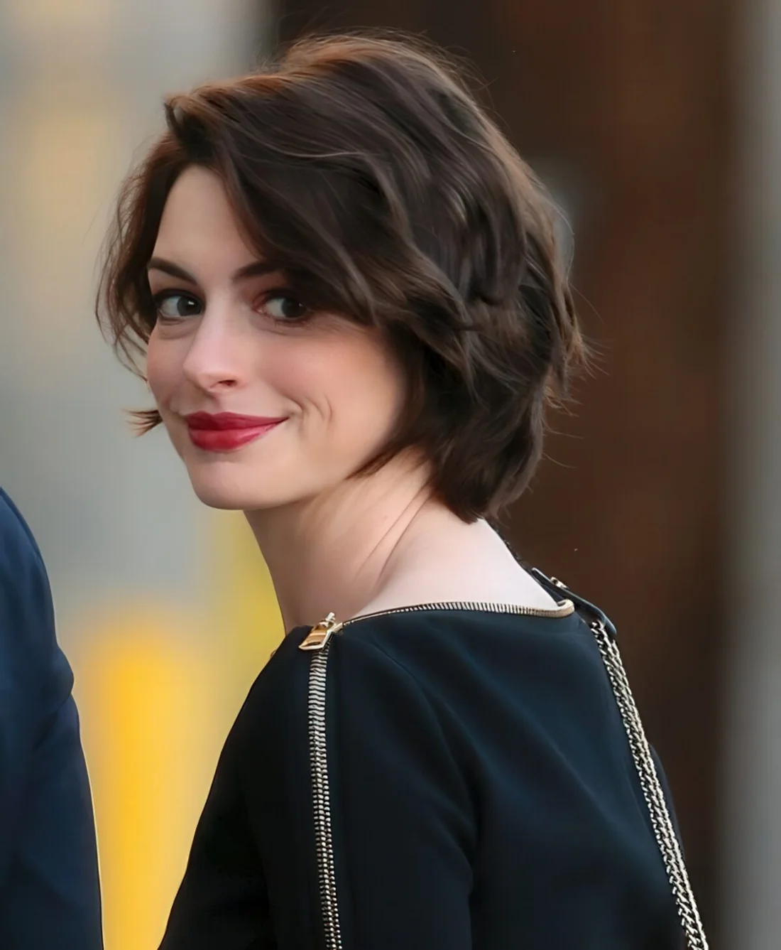 Short layered bob with light waves.