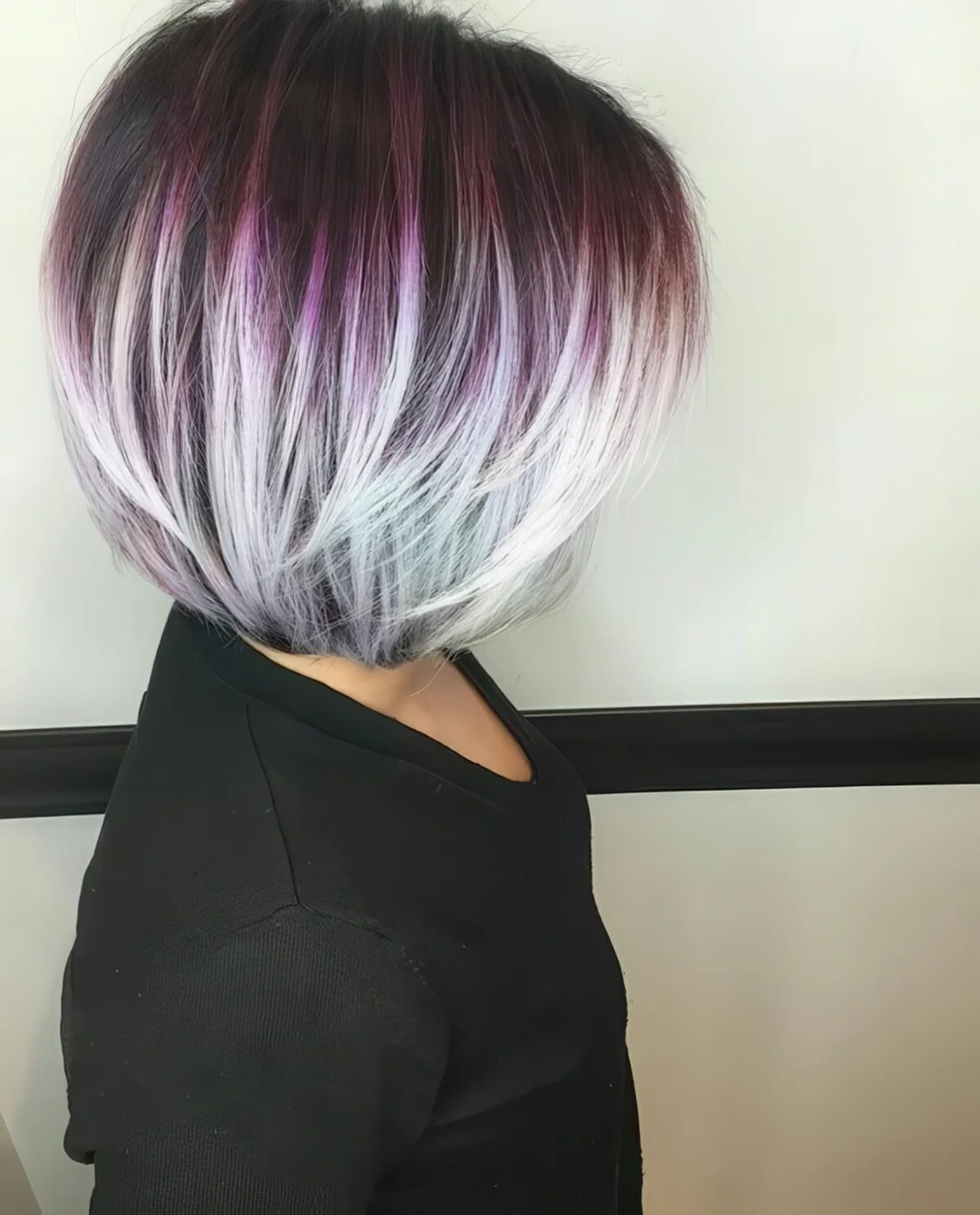 Highlight your layered haircut with a bold ombre like here from purple to grey.
