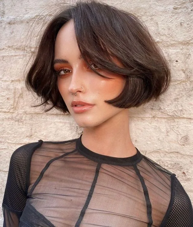 Photo showing french bob bangs, with the hairstyle clearly visible.