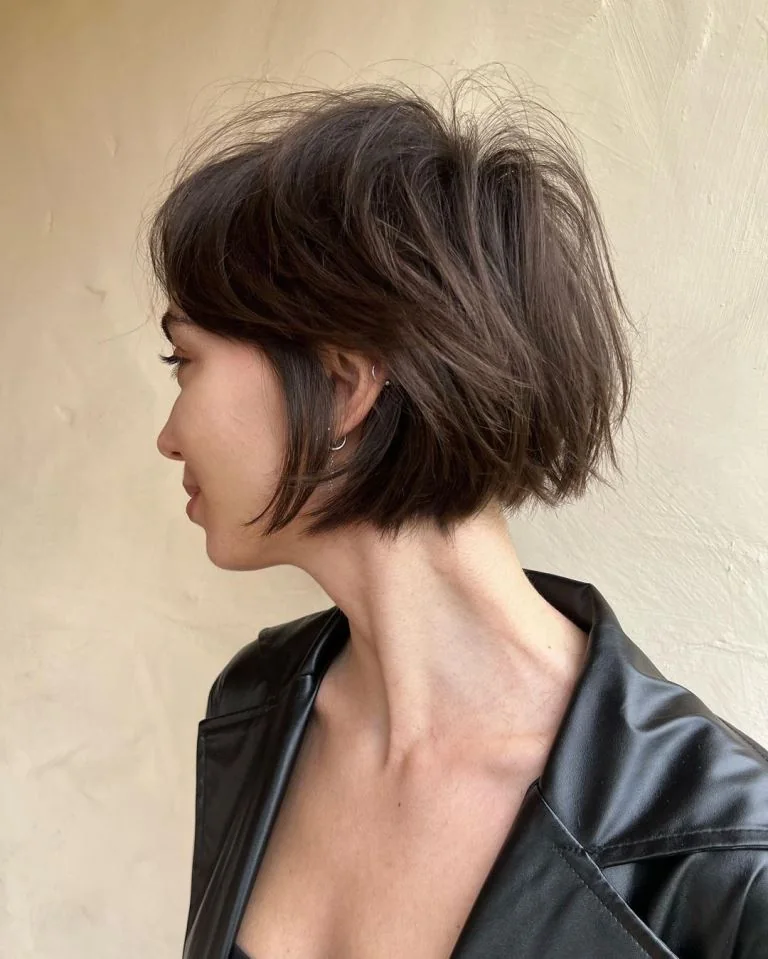 Photo showing short messy bob, with the hairstyle clearly visible.